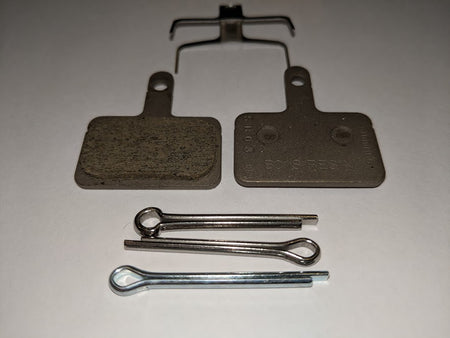 Shimano - B01S disc brake pads and spring, steel backed, resin